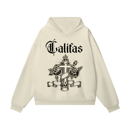 Beige chicano style hoodie with black graphic of cross and virgin mary, 'Califas' text on a white background-premium chicano clothing by sleepy lagoon co.